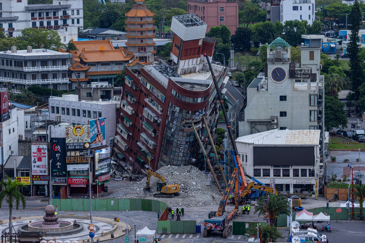 Image Source: General view of a collapsed building following the earthquake on April 05, 2024 in Hualien, Taiwan. (Photo by Annabelle Chih/Getty Images)