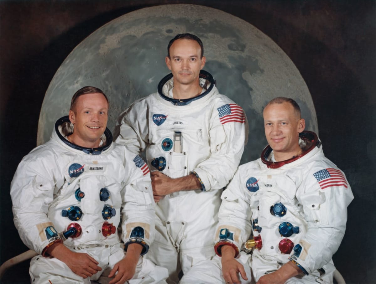 The three crew members of NASA's Apollo 11 lunar landing mission pose for a group portrait a few weeks before the launch, May 1969. From left to right, Commander Neil Armstrong, Command Module Pilot Michael Collins and Lunar Module Pilot Edwin 'Buzz' Aldrin Jr. (Photo by Space Frontiers/Getty Images)
