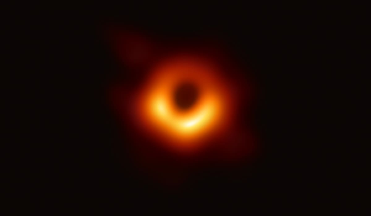 Image Source: In this handout photo provided by the National Science Foundation, the Event Horizon Telescope captures a black hole at the center of galaxy M87 in an image released on April 10, 2019. (National Science Foundation via Getty Images)
