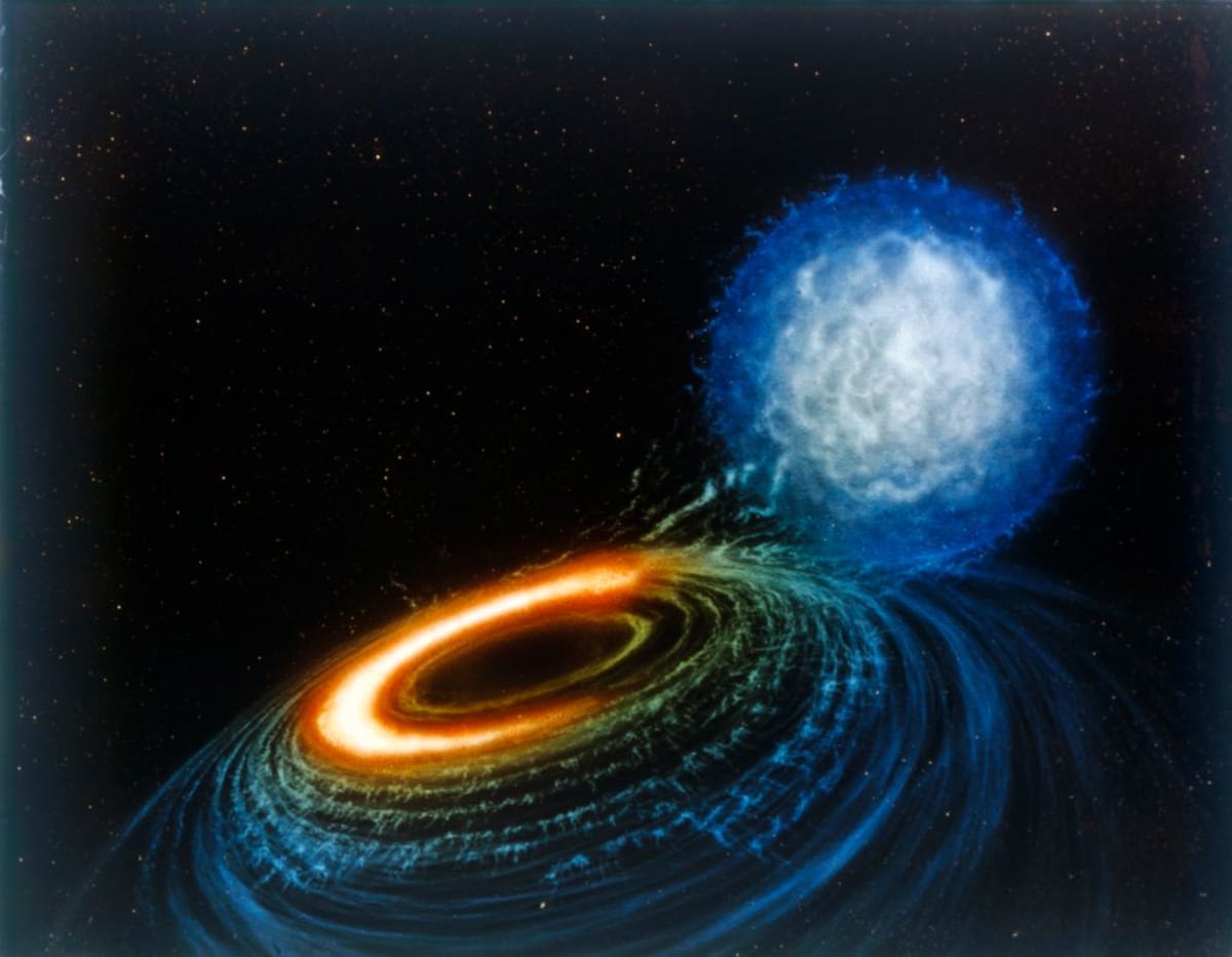 Image source: A black hole is a place in space where gravity pulls so much that even light can not get out. The gravity is so strong because matter has been squeezed into a tiny space. (Photo by Heritage Space/Heritage Images/Getty Images)