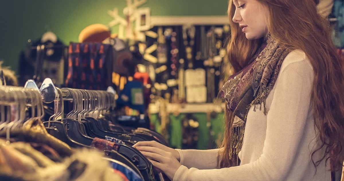 Woman finds an emotional tag attached to a sweater while shopping at a thrift store