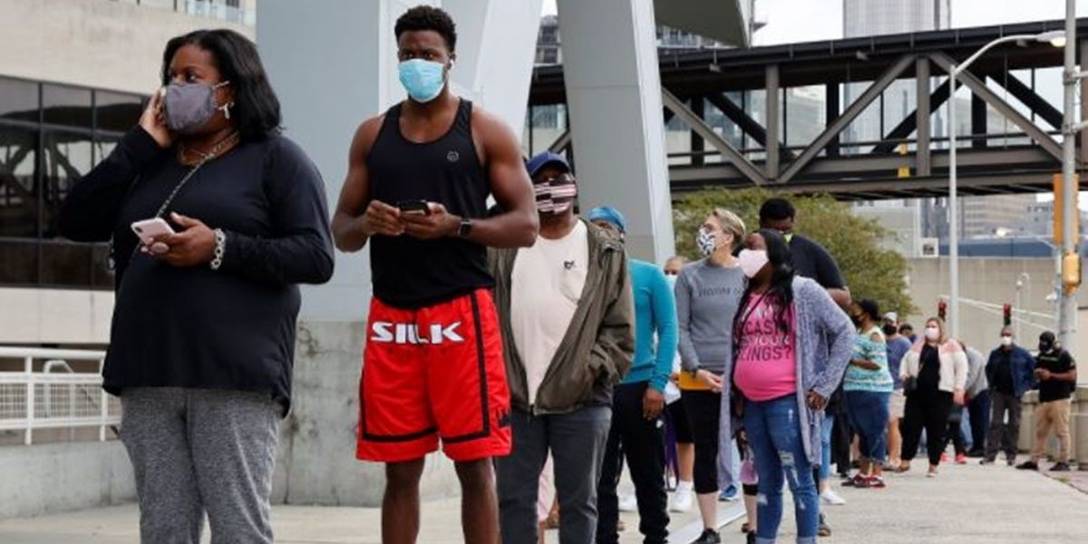 Massive in-person voting lines in Georgia exemplify 'voter suppression,' say critics