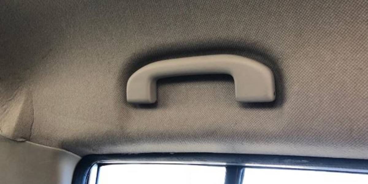 Someone finally figured out exactly what that handle on car ceilings is for